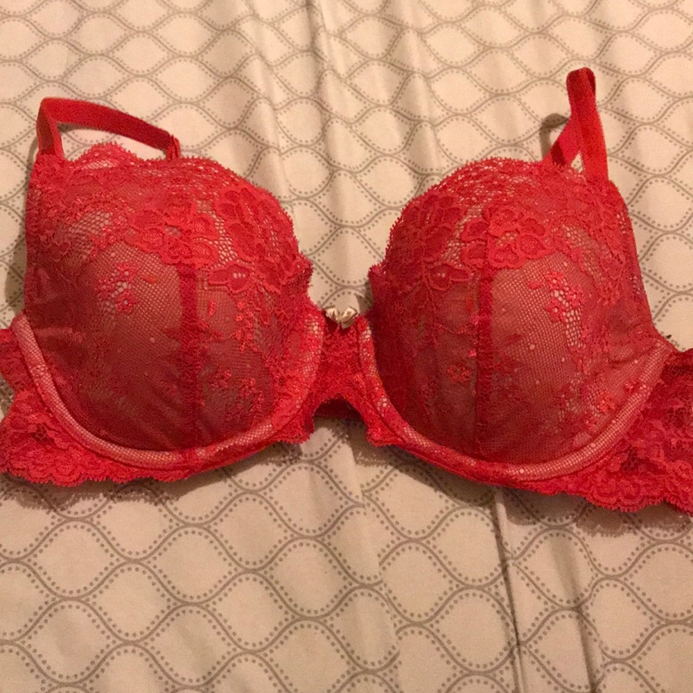 A red lightly lined Victoria secret bra size 34D